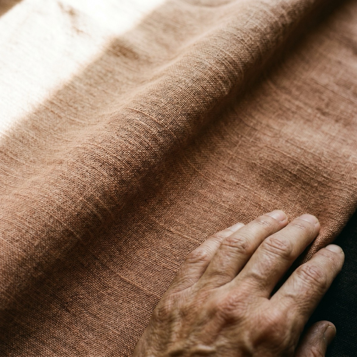 Linen — woven texture, raked light